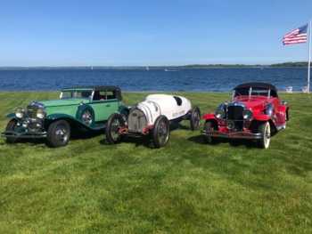 Three Duesenbergs on Shappy residence lawn